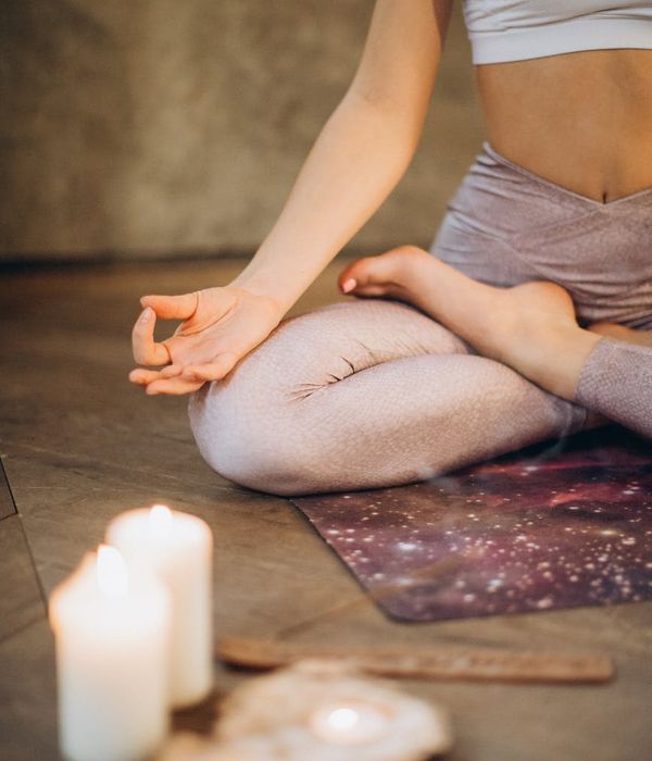 Woman in a calm yoga pose, embodying balance and inner peace.